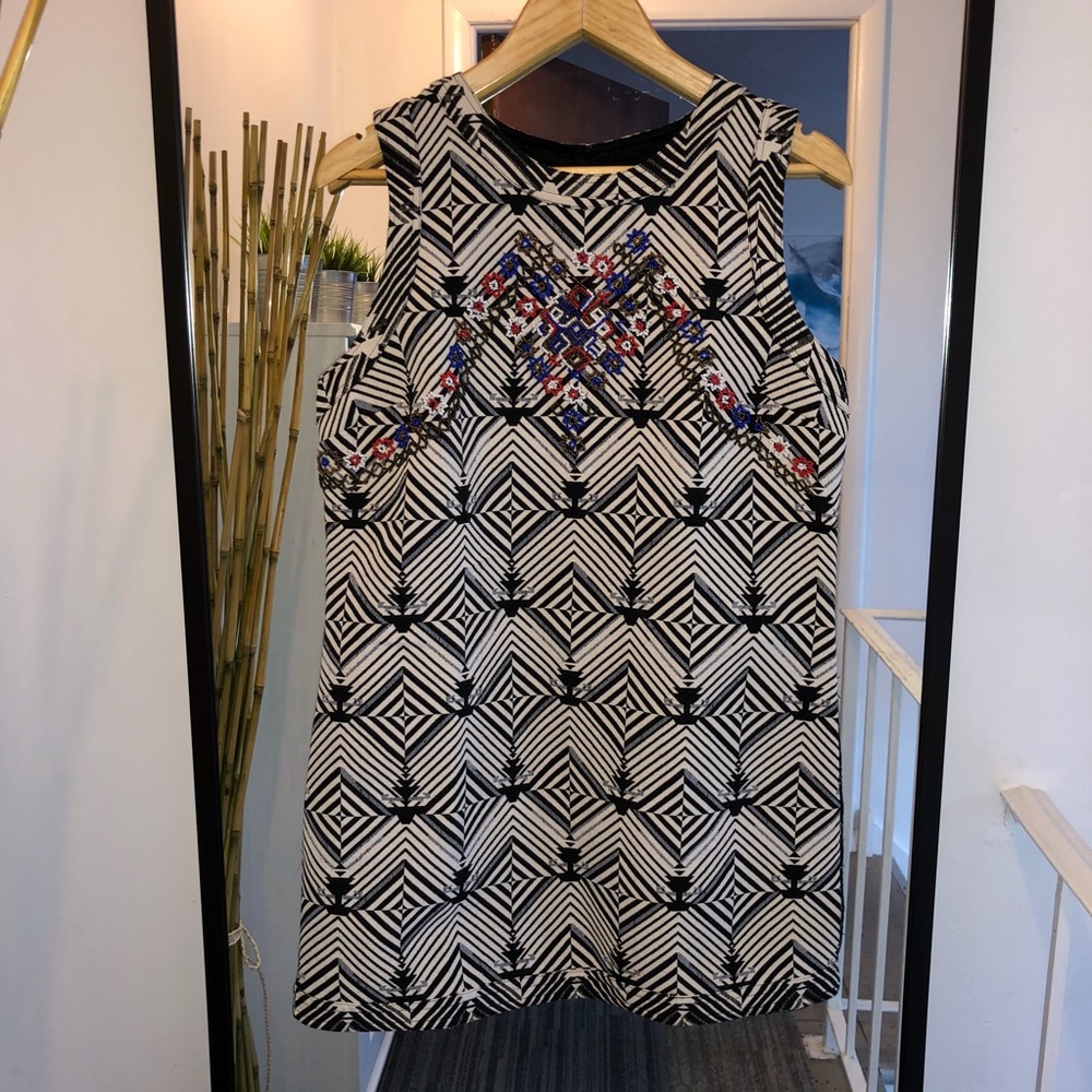 FREE PEOPLE - mini dress with detaining.